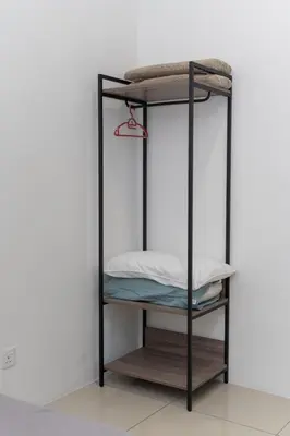 a black bunk bed in a room at Bright & Airy Double-Storey Retreat 4BR in Simpang Ampat