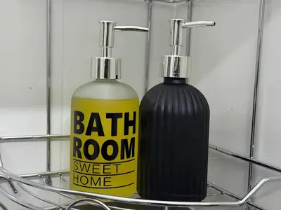 a couple of bottles of hair shampoo and aptionermott at Serenity Haven Family Stay Ipoh 10-12 Pax in Ipoh