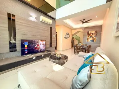 a living room with a white couch and a tv at Ipoh City Centre Penthouse 12-15 Pax KTV BBQ in Ipoh