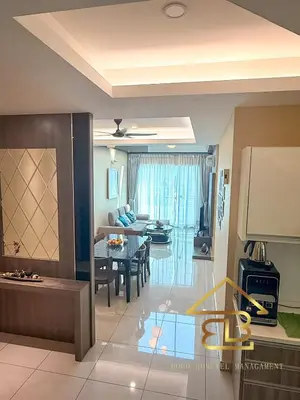 a kitchen and living room with a table and a dining room at Ipoh City Centre Penthouse 12-15 Pax KTV BBQ in Ipoh