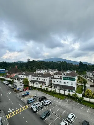 an aerial view of a parking lot in a city at Ayaan Fifa Home Juniors with Netflix and Ps4 Games in Tanah Rata
