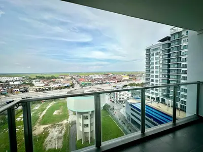 a view of a city from a balcony of a building at \u7a3b\u5cb8 DaoAn Homestay-with balcony in Sekincan