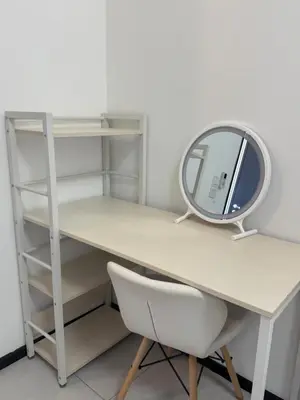 a desk with a mirror and a chair at Urban Suites Home Suites by Twinkle Loft in George Town