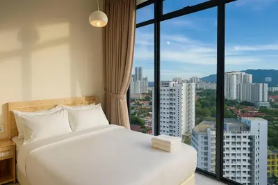 a bedroom with a white bed and a large window at \u3010Lux\u3011HighFloor wi SunSet | Infinity Pool | KTV 207 in George Town