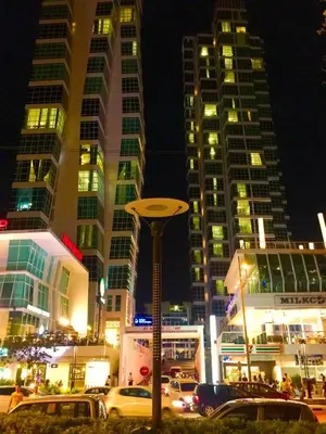 a city at night with cars and tall buildings at \u3010SeaView\u3011High Floor 2BR Duplex SeaFront-Town 20 in George Town