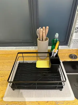 a rack with utensils on a kitchen counter at #15mins walk to Kea Farm#4bedrooms4bathrooms#10pax in Brinchang