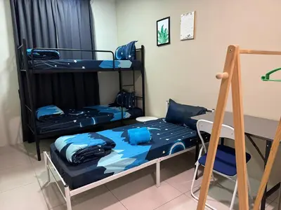 a room with two bunk beds and a ladder at Big Big Big family escape 4BR side pool view, Ipoh in Ipoh
