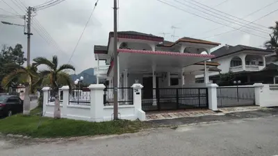 a white house with a fence in front of it at sunshine bnb concept service in Ipoh