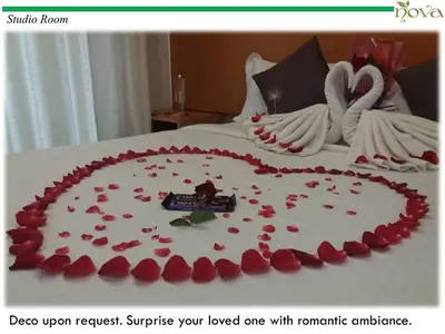 a bed with a heart made out of red roses at Cameron Nova Highlands Resort V in Brinchang