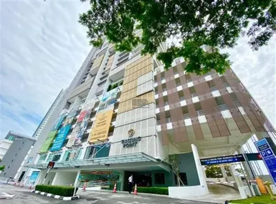 a tall building with a lot of windows at Seaview Studio 2BR 3BR Tanjung Point Residences in Tanjong Tokong