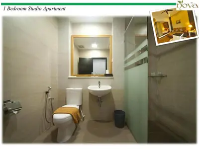 a bathroom with a sink and a toilet and a mirror at Cameron Nova Highlands Resort VIII in Brinchang