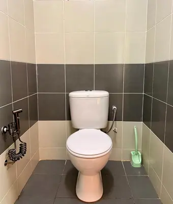 a bathroom with a white toilet in a room at Asa and Mori Japandi, Emerald Avenue, Brinchang in Tanah Rata
