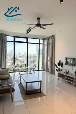 a living room with a ceiling fan and a table at Beacon 2 bedroom at Jalan Sungai Pinang George Town Penang in George Town
