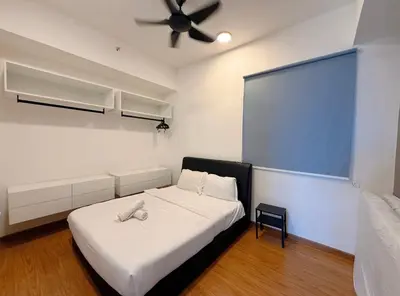 a bedroom with a bed and a ceiling fan at Beacon 2BR with Infinity Pool at Jalan Sungai Pinang George Town Penang in George Town