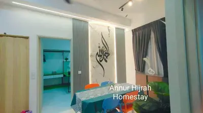 a room with a bedroom with a bed and a window at Homestay Annur Hijrah Seri Iskandar Near UiTM ,UTP in Seri Iskandar