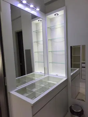 a bathroom with a large mirror and white cabinets at RoomB w attached bathroom w bathtub in George Town