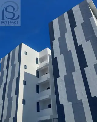 a building with a geometric design on the side of it at Putspace Empire-Bandar Baru Putra, Ipoh Perak in Ipoh