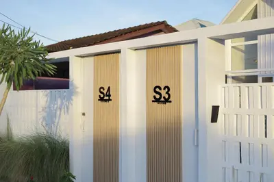 a white door with the number on it at Sarang A Cottage with private pool in Sungai Petani