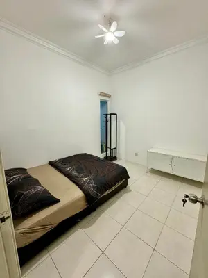 a bedroom with a bed and a ceiling fan at AYAAN Highland Escape with PS4 gaming and Netflix at Cameron Highland in Tanah Rata