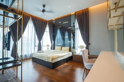 a bedroom with a bed in a room with windows at Cheekaaboo Playhouse Ipoh I Private Pool Family Stay with Indoor Playzone in Ipoh