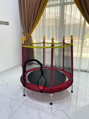 a red and black bed in a room at Hijrah De La Villa Parit Buntar Nibong Tebal Penang in Nibung Tebal