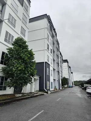 an empty street in front of a white building at HS Homestay Casa Klebang Ipoh in Chemor