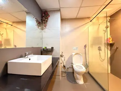 a bathroom with a sink and a toilet at Equatorial Hill Resort, Mountain view In Cameron Highlands in Brinchang