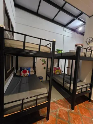 a room with two bunk beds in a room at New ! 6 Pax Super Mario Georgetown Heritage Pre-war House 2 Bedroom in George Town