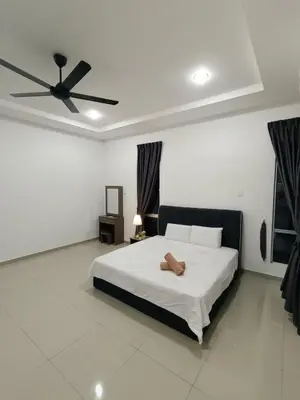 a bedroom with a bed and a ceiling fan at Lahat Serenity 168 Big Corner Cozy House in Lahat