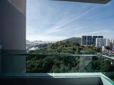 a view of a city from a building window at 22 Penthouse by BRB, Airport View & 18 Pax in Bayan Lepas