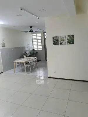 a white room with a table and a white tile floor at Homestay Bajet EM3 Pantai Damai 2 in Pantai Remis