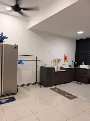 a kitchen with two refrigerators and a ceiling at KAYA HOMESTAY SRI IORa 2 in Sungai Petani