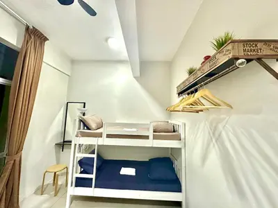 a small room with a bunk bed in a room at Homestay Golden Hills Apartment Penthouse in Brinchang