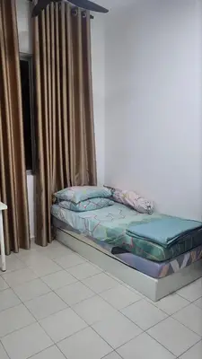 a small bed in a room with a window at Homestay PPAM Dalur Apartment Presint 18,Putrajaya in Gua Sai
