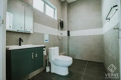 a bathroom with a toilet and a sink and a shower at Ipoh 55 Private Pool By Verve 26PAX in Ipoh
