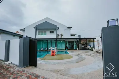 a house with a swimming pool in a yard at Ipoh 55 Private Pool By Verve 26PAX in Ipoh