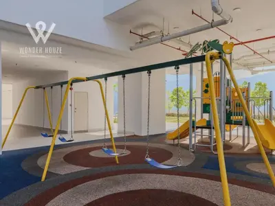 a play room with swings and a slide at Modern 3BR Retreat at Bandar Baru Air Itam near Air Itam and Kek Lok Si in Ayer Itam