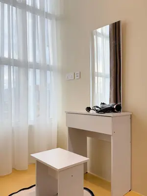 a white desk with a mirror on top of it at KB Penang Guest House Bertam Avenue 1-10pax Signature Cozy Kids in Kepala Batas