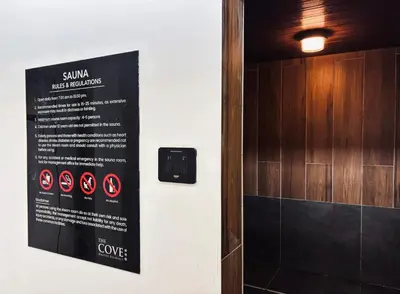 a sign on the wall of a bathroom with a shower at Ipoh The Cove Hillside Premier Suites By LUX SUITE in Ipoh