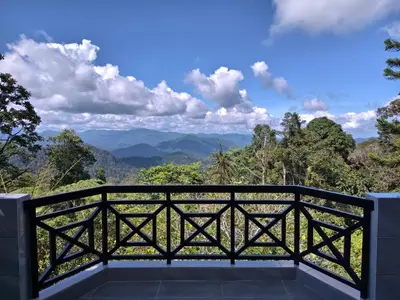 a balcony with a view of the mountains at Little England B5-1 Fraser Panorama in Bukit Fraser