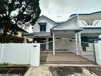 a white house with a gate in front of it at Bagan Cozy Family Retreat 4BR 10 Pax in Butterworth