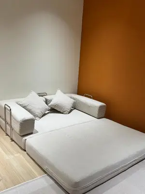 two beds in a room with a wall at Penang Stay 2-6px Convenient Free parking in George Town