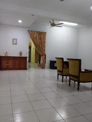 a living room with chairs and a table and a ceiling at NORDIAZZ Home in Ipoh
