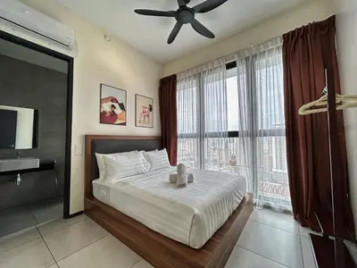 a bedroom with a bed with a teddy bear on it at Le Cozy Cabin - 2B2R SeaCity View Infinity Pool in George Town