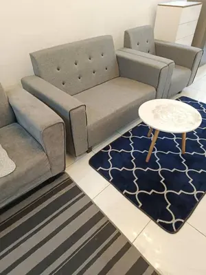a living room with a couch and a table at AR Homestay SP TRJ in Sungai Petani