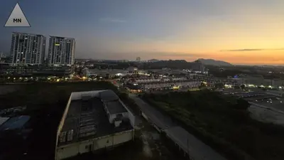 a view of a city at night with buildings at ModernNest-V1-PS5-sleep10 in Bukit Mertajam
