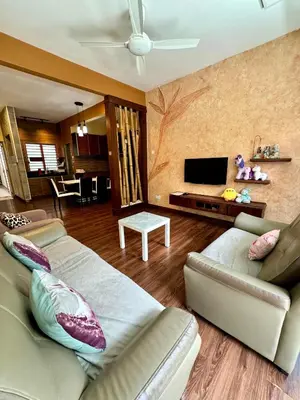 a living room with a couch and a flat screen tv at Ayaan Bliss Homestay at QuintetTanahRata in Cameron Highlands