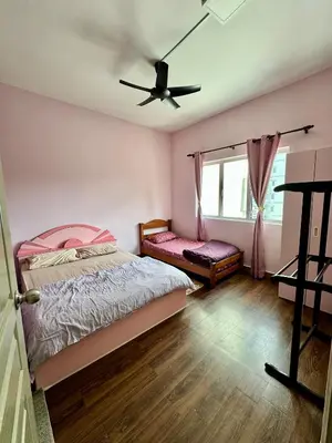 a bedroom with a bed and a ceiling fan at Ayaan Bliss Homestay at QuintetTanahRata in Cameron Highlands