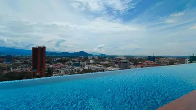 a swimming pool with a view of a city at Horizon Skyline Loft in Ipoh
