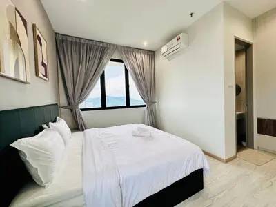 a bedroom with a white bed and a window at dream sweet home bayan lepas iconic netflix usm in Bayan Lepas